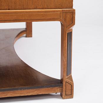 Carl Bergsten, an oak veneered sideboard/ chest of drawers, Nordiska Kompaniet Sweden 1923. Part of a set exhibited in Gothenburg 1923.
