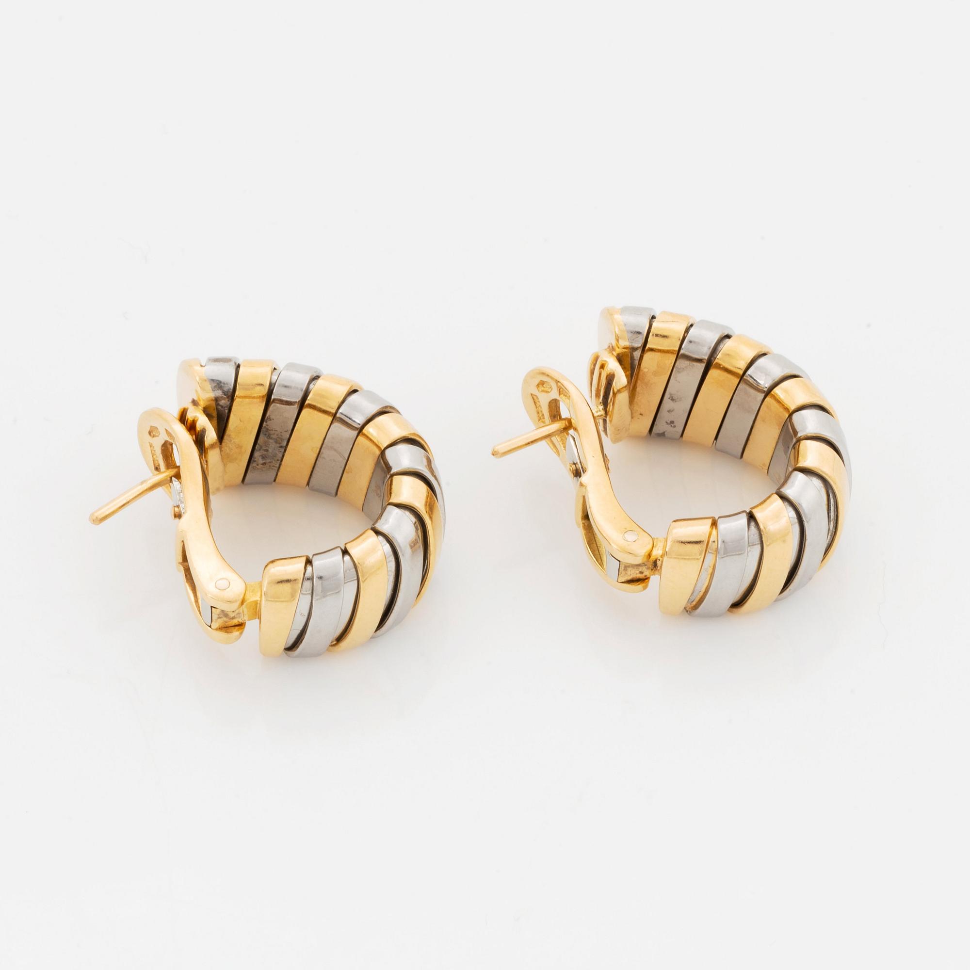 A pair of Bulgari "Tubogas" earrings in 18K gold and steel.