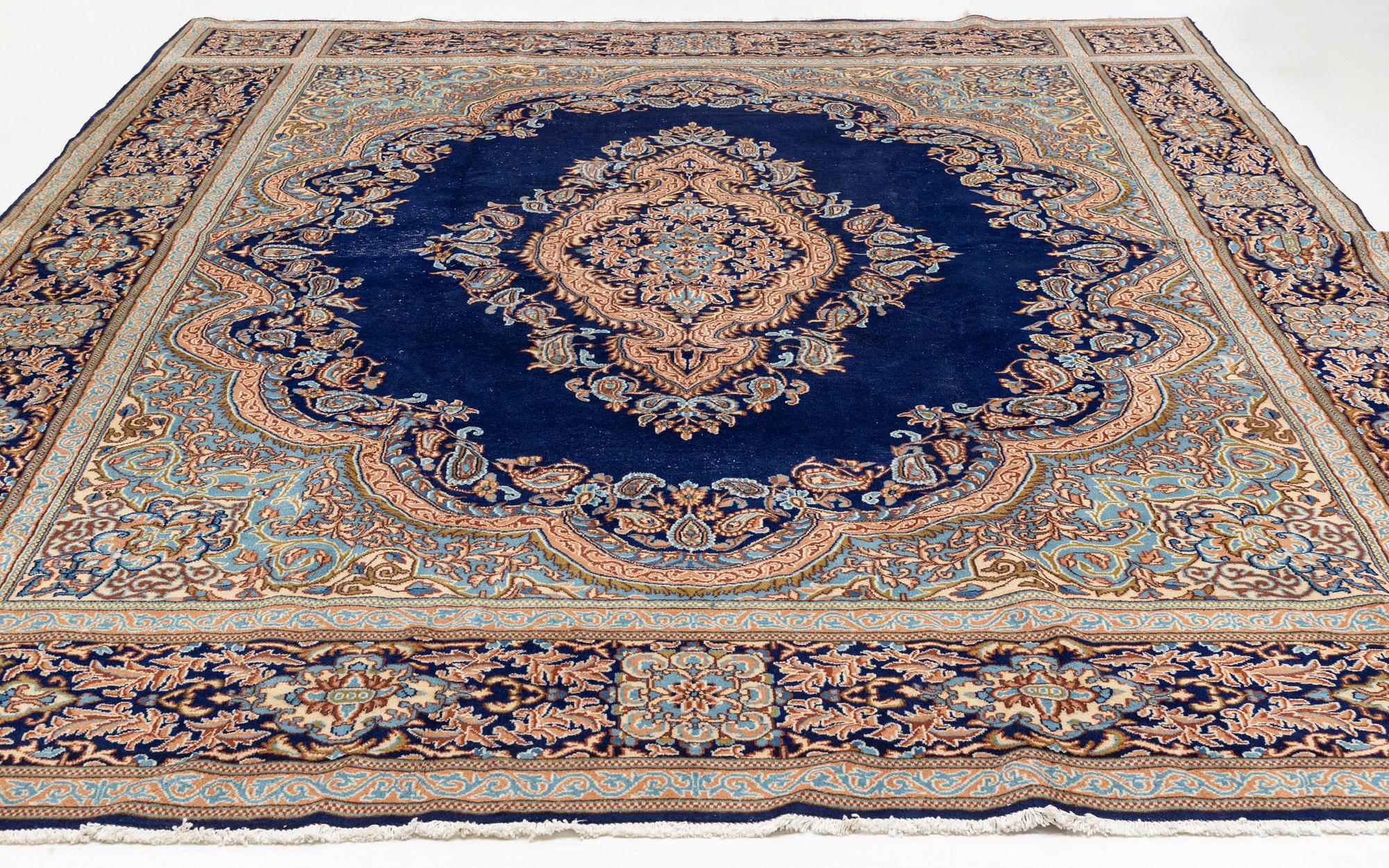 A Kerman carpet, circa 403 x 301 cm.