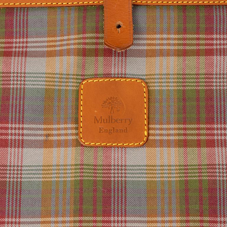 Mulberry, a scotch grain suitcase.