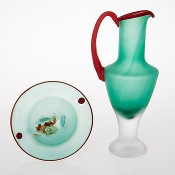A glass bowl and decanter, signed, Kosta Boda, second half of 20th Century.