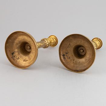 A pair of Louis XVI candlesticks.