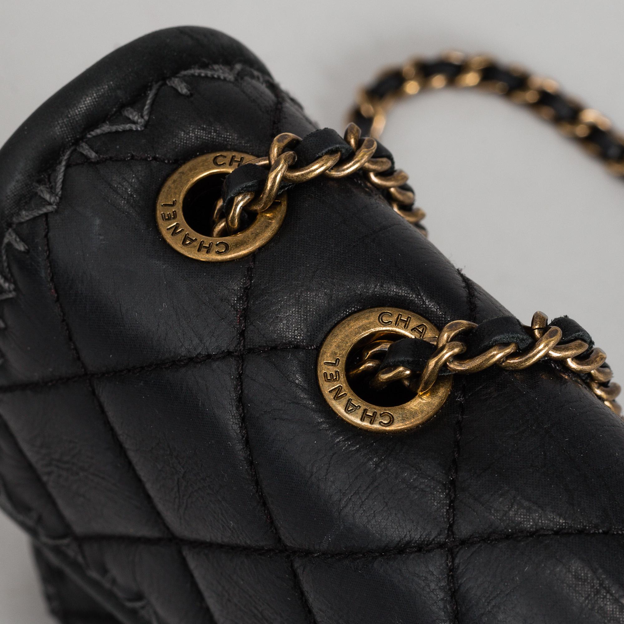 CHANEL, a black quilted fabric 'Flap Bag', 2015-2016.