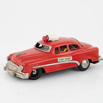 Nine toy cars, mostly Dinky toys.