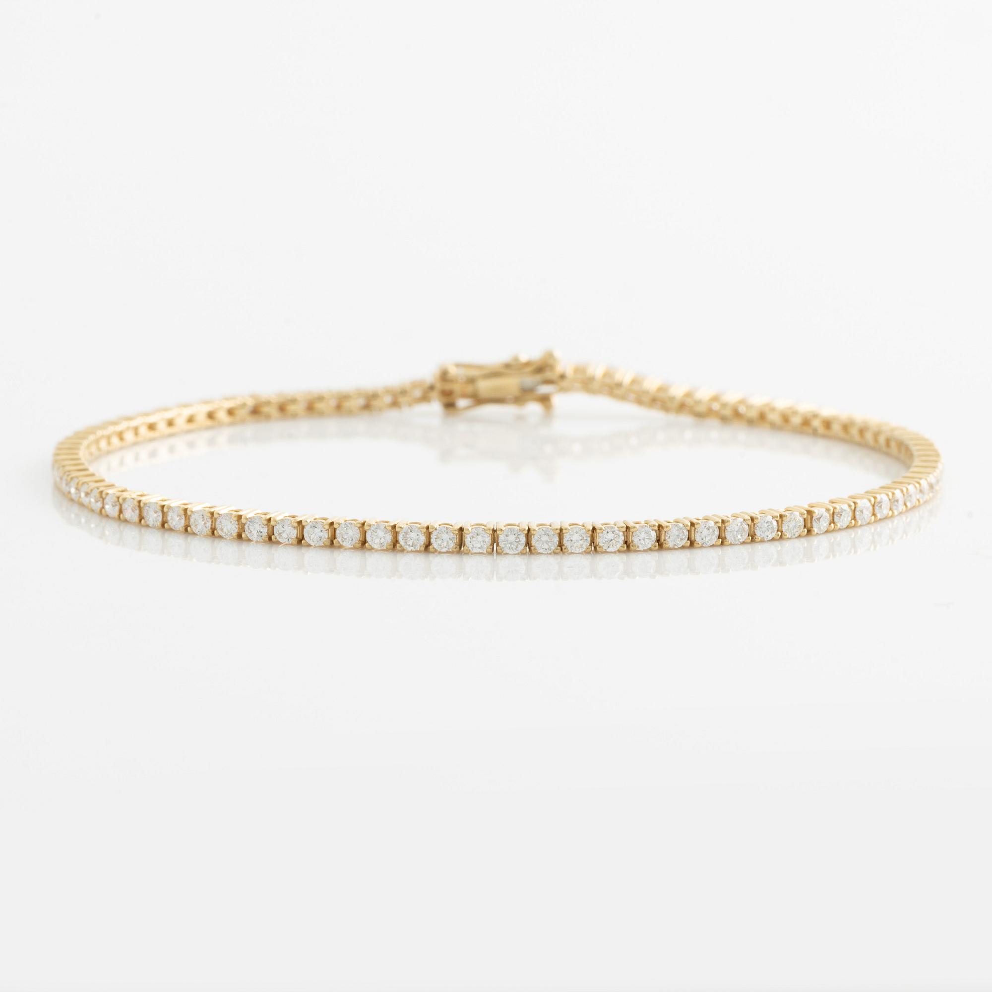 Tennis bracelet, 14K gold with brilliant-cut diamonds.