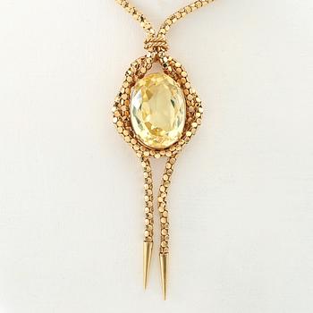 Necklace 18K gold with an oval faceted green synthetic spinel.