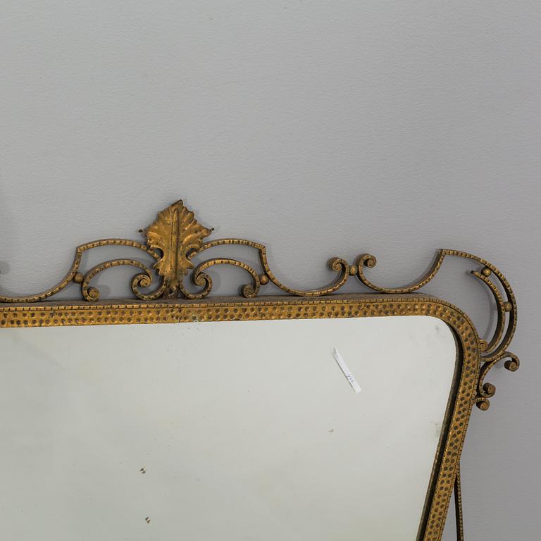 A PIERRE LUIGI COLLI MIRROR AND TABLE.