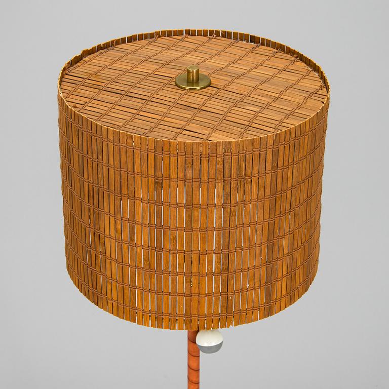 A mid-20th century floor light for Itsu.