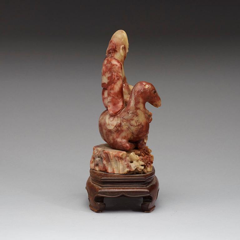 A soapstone figurine of Shoulao, Qing dynasty (1644-1912).