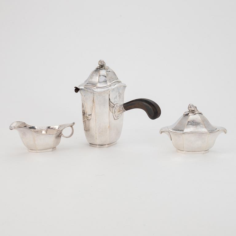 Jacob Ängman, a silver coffee pot, creamer and sugar bowl, GAB, Stockholm 1929.