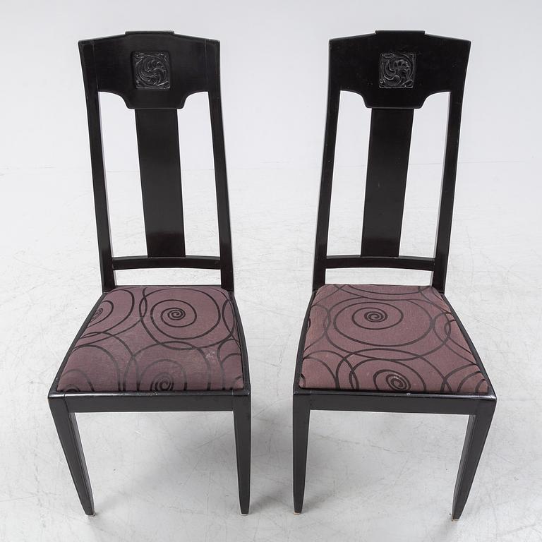 Ten carved oak chairs, Myrstedt & Stern A.-B., Stockholm, early 20th Century.