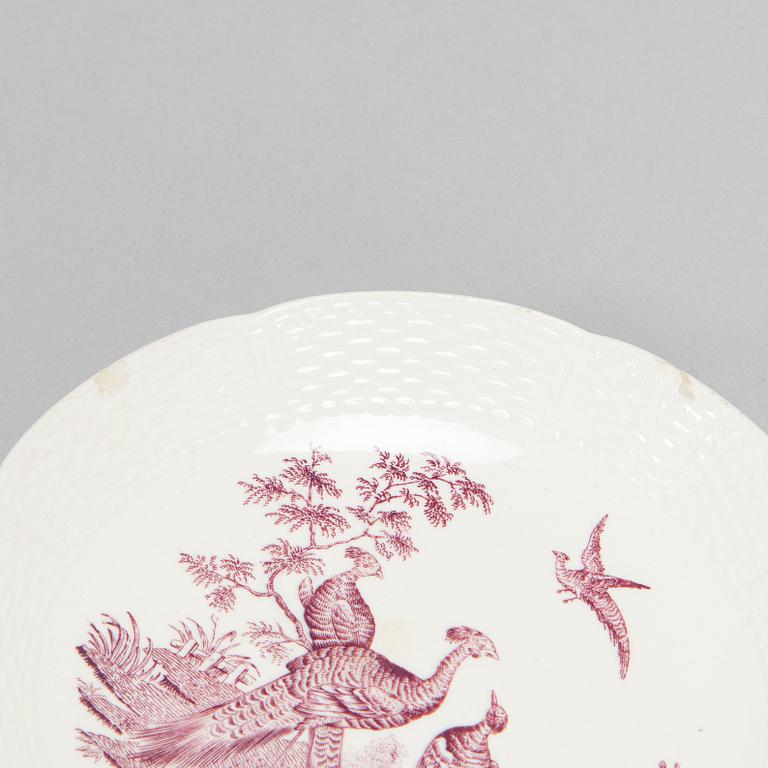 A 53-piece set of Wedgwood 'Liverpool birds' rimmed plates, early 20th century.