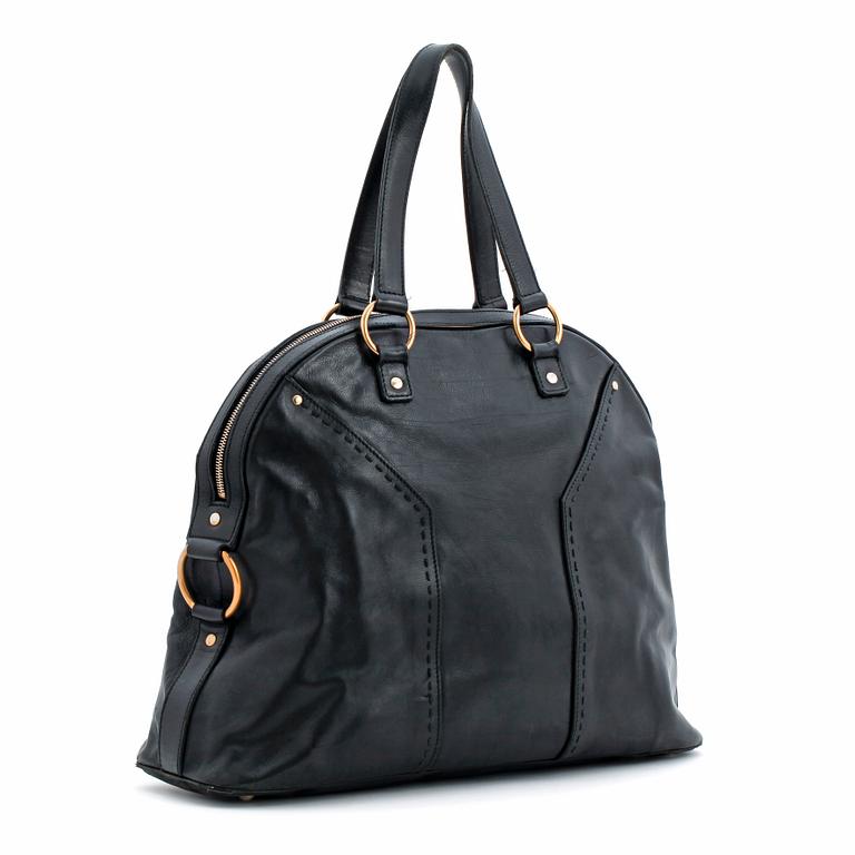 Yves Saint Laurent, YVES SAINT LAURENT, a black leather shoulder bag, "Muse".