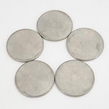 A group of 10 pewter coasters and 3 dishes, Firma Svenskt Tenn, 1948 and 1946.