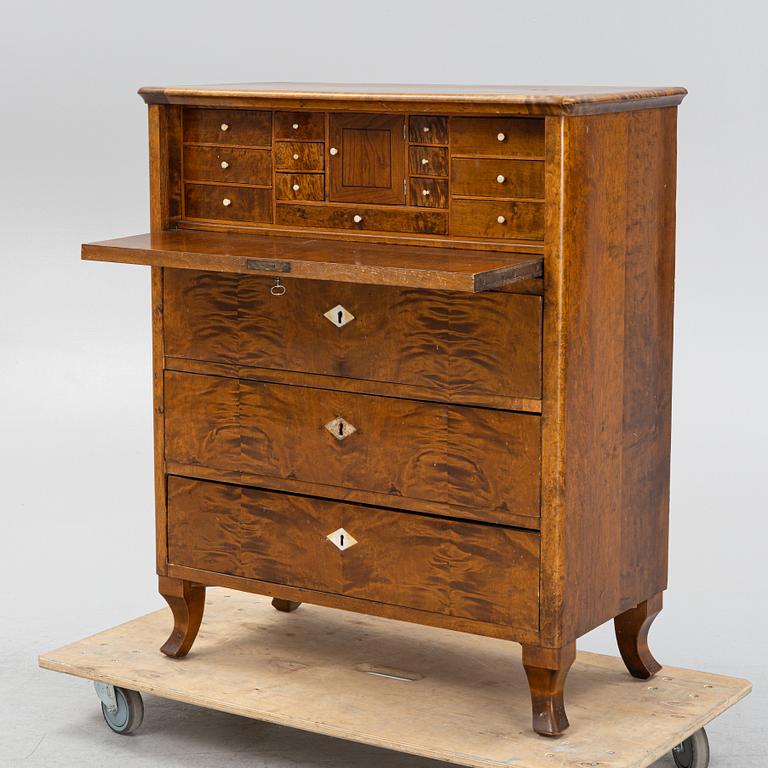 A birch-veneered dresser, second half of the 19th century.