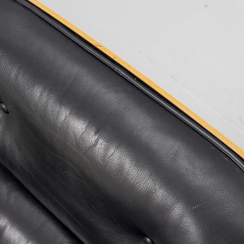 Charles & Ray Eames, an 'Eames Lounge Chair' with ottoman, Vitra.