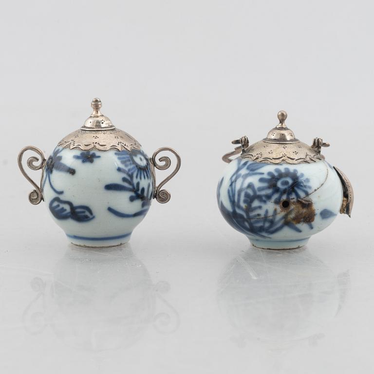 A group of six Chinese blue and white porcelain miniatures and a caddy with cover, Qing dynasty, partly Kangxi.