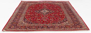 A carpet, Kashan, ca 355 x 245 cm.