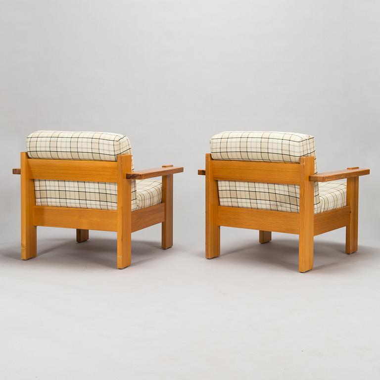 A pair of 1970's armchairs.