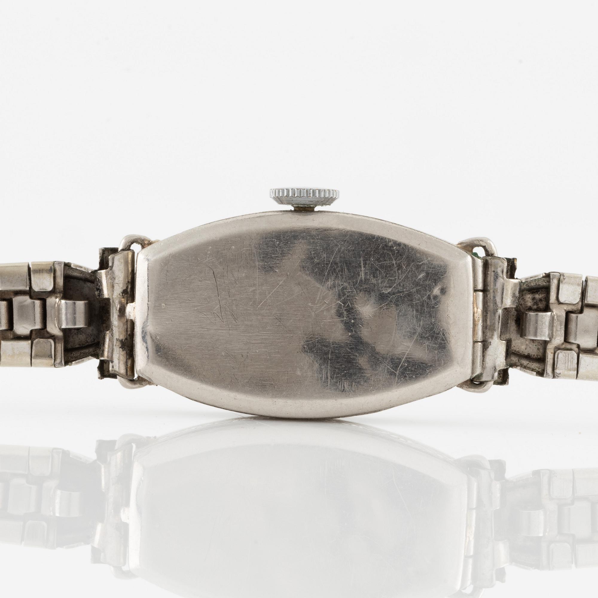 Bulova, wristwatch, platinum with diamonds, bracelet in steel.