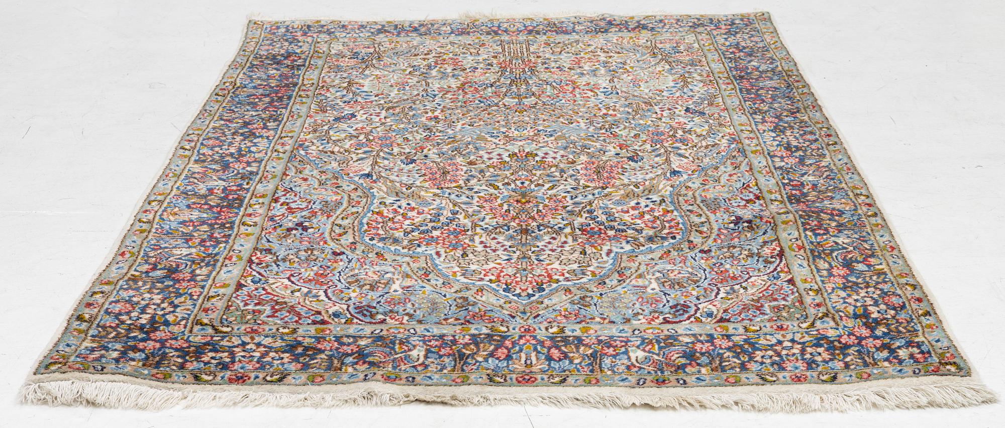Carpet, Kirman, antique, approx. 242 x 146 cm.
