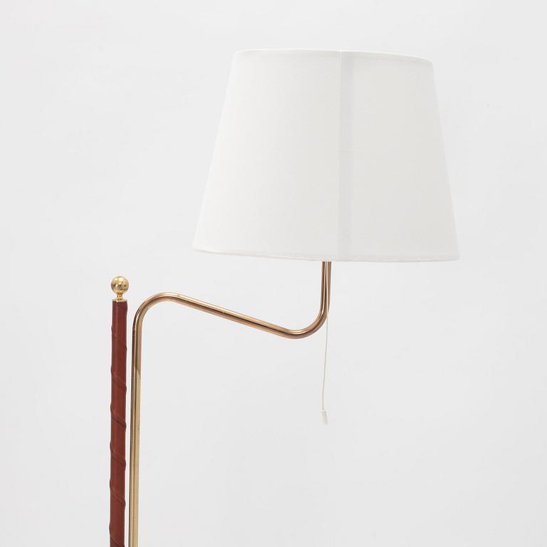 A pair of brass model G 132 floor lamps from Bergboms, end of the 20th Century.