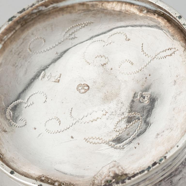 Beaker, silver 1835, cream-jug, silver 1826 and bread-plate, silver 1952.