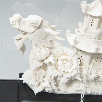 An oriental Boat sculpture in porcelain.