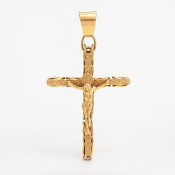 An 18K gold cross pendant.