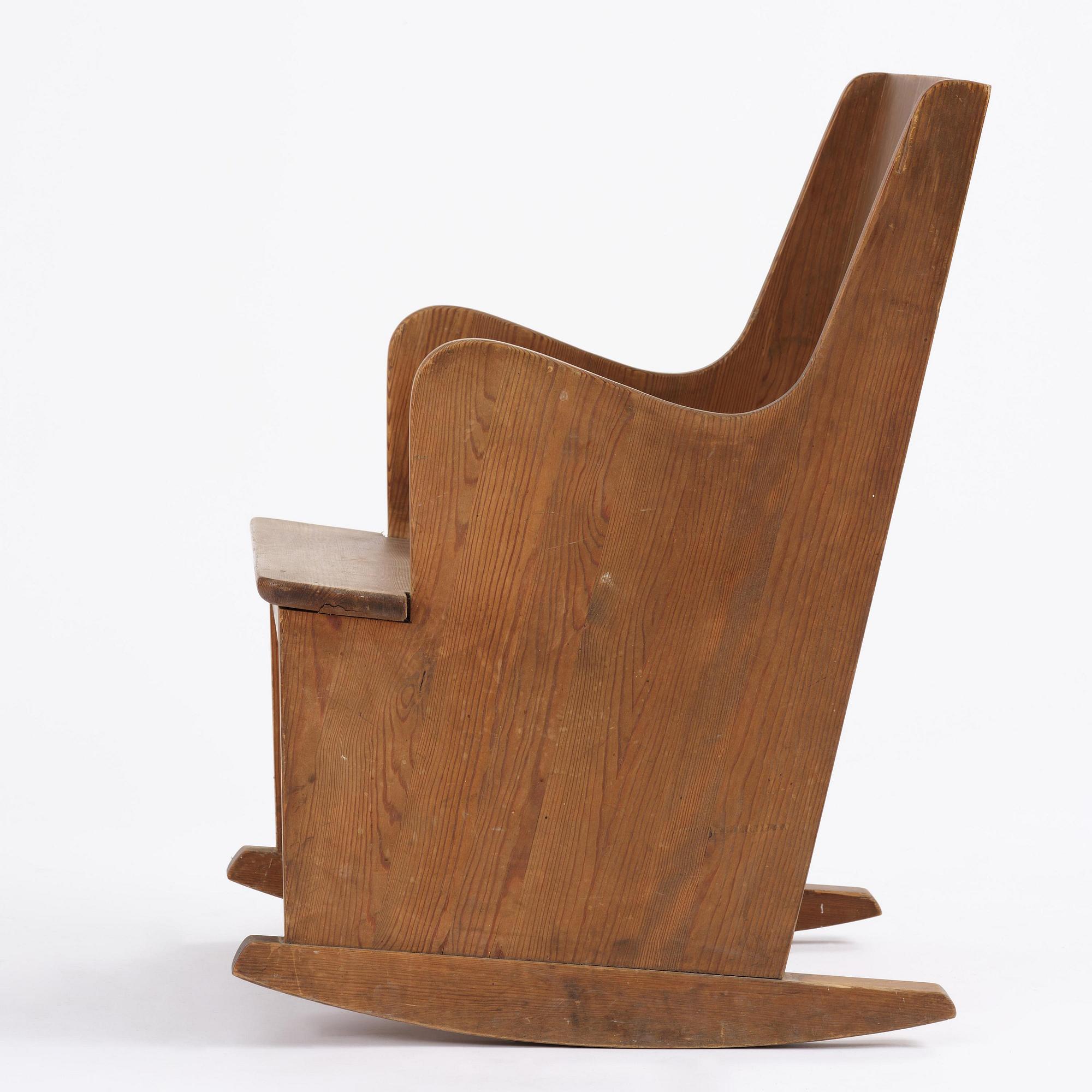Axel Einar Hjorth, a stained pine "Lovö" rocking chair, Nordiska Kompaniet, Sweden, 1930s.