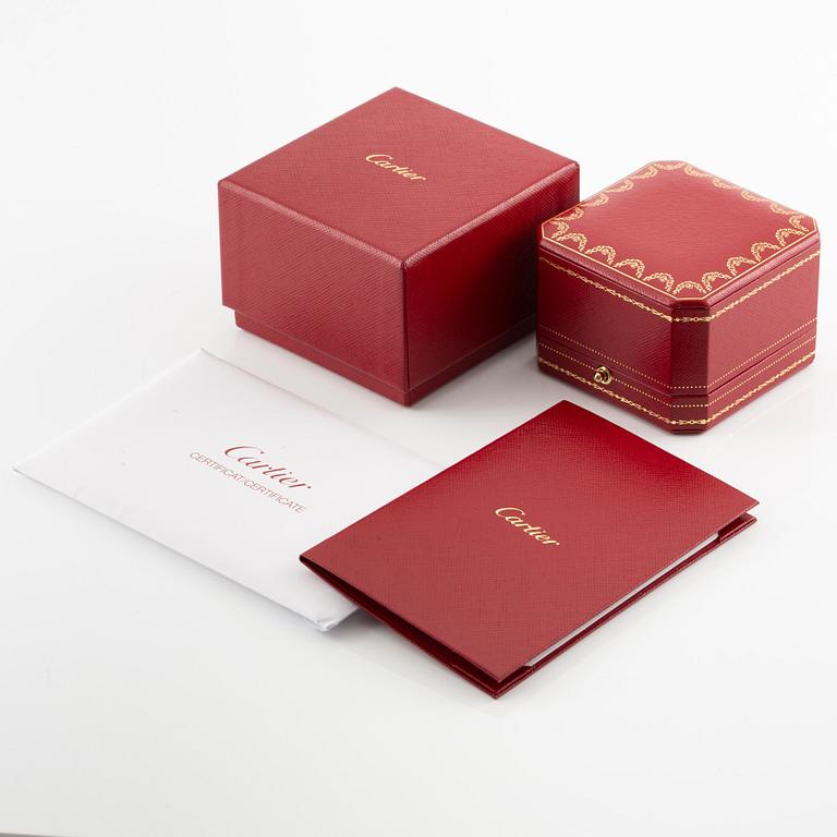 A Cartier ring in platinum with a round brilliant-cut diamond 0.91 ct according to the engraving.