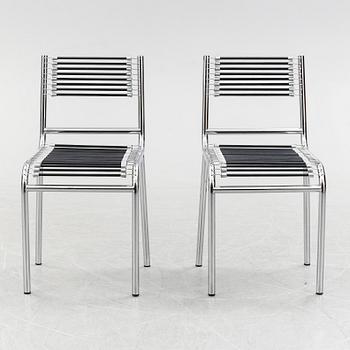 A pair of Rene Herbst chromium-plated, "Sandows" chairs, late 20th century.