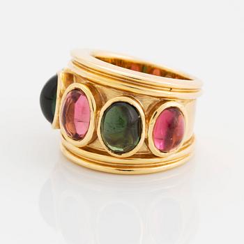 An 18K gold Temple St Clair ring set with cabochon-cut tourmalines.