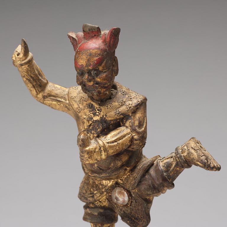 A gilt lacquer sculpture of deity, Qing dynasty, 18th Century.