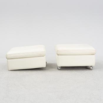 A pair of leather upholstered foot stools, Dux, later part of the 20th Century.