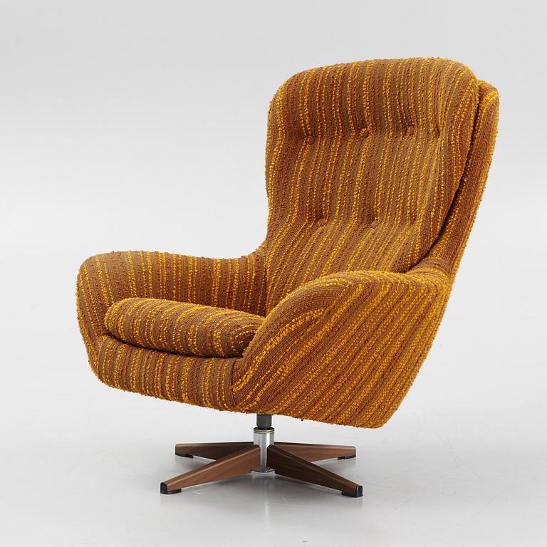 A 'Salome' swivel easy chair from Swedfurn from äround 1970.