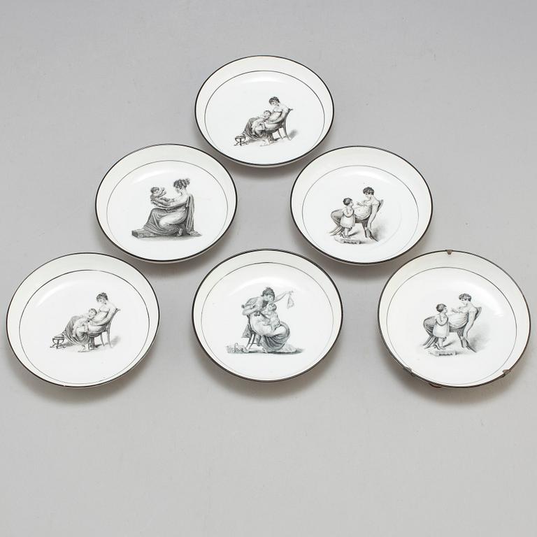 Six soft paste cups with saucers, early 19th century.