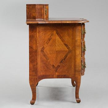 A late baroque walnut parquetry commode by C. Linning (master in Stockholm 1744-79).