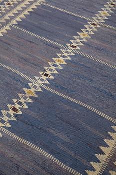 Barbro Nilsson, a carpet, "Salerno blå", flat weave, ca 312 x 201,5-205,5 cm, signed AB MMF BN.