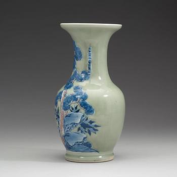 A celadon ground porcelain baluster vase, Qing dynasty (1644-1912).