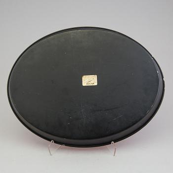 A tray by Piero Fornasetti, Milan, Italy.