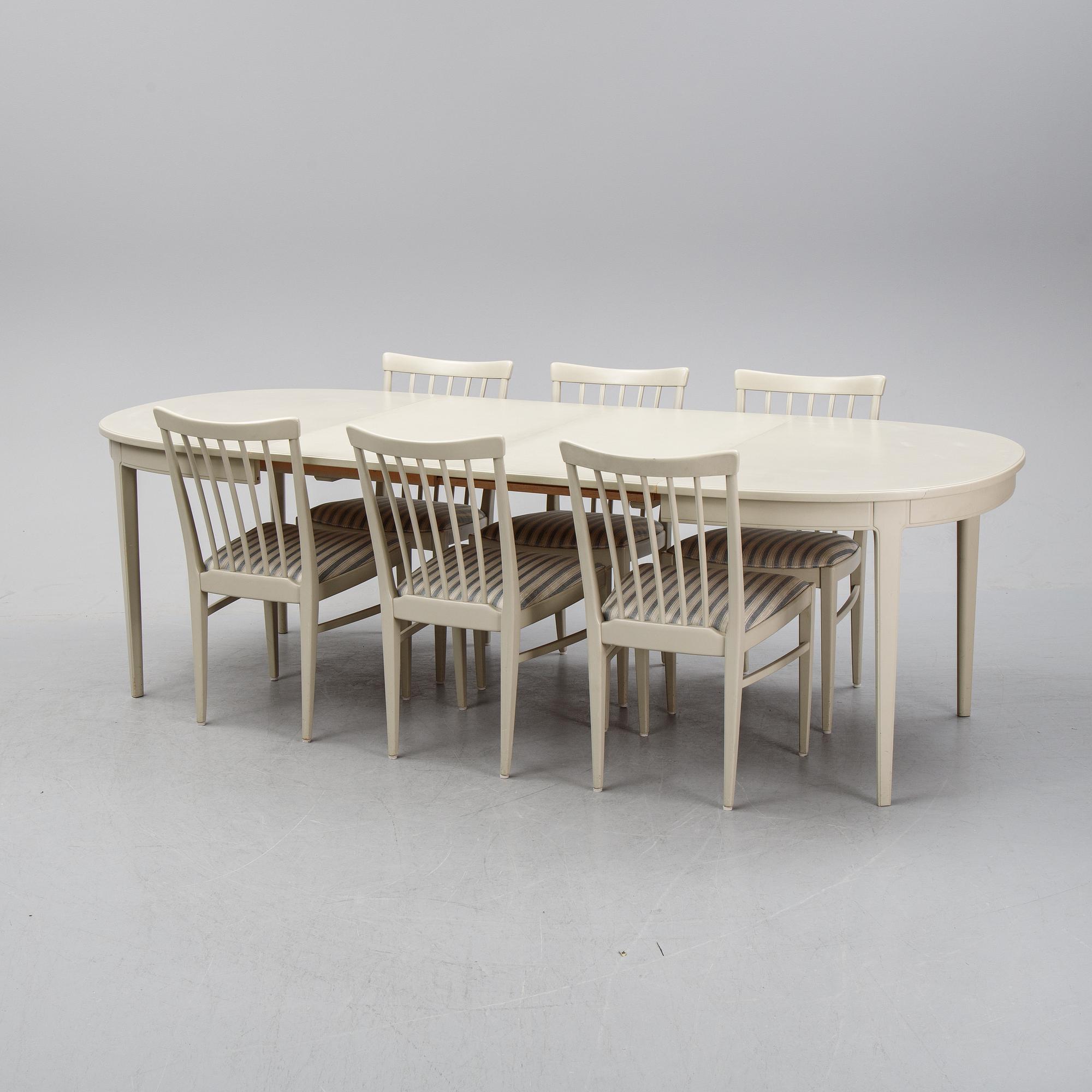 A dining table and six chairs by Carl Malmsten for Bodafors.
