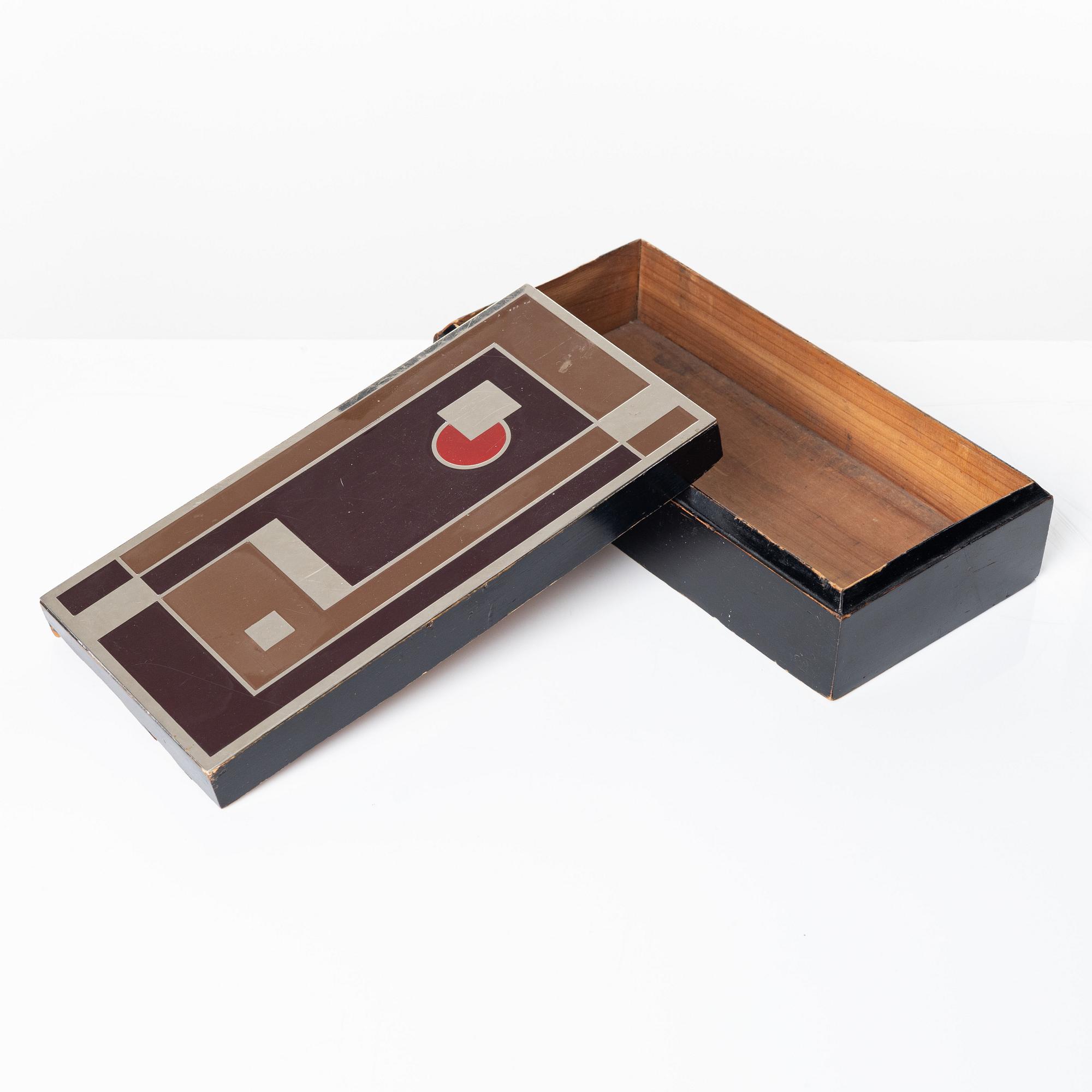 Walter Dorwin Teague, a folding camera in in a lacquered case, USA 1930s.