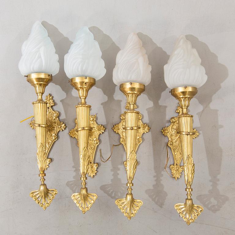 A set of four wall lamps later part of the 20th century.