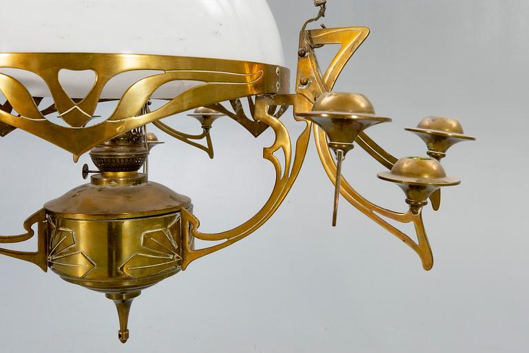 A Jugend brass celing paraffin lamp.