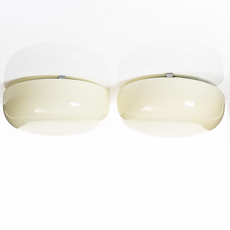 Harald Notini, a pair of ceiling lamps model "10676", Arvid Böhlmarks Lampfabrik, Stockholm, 1930s.