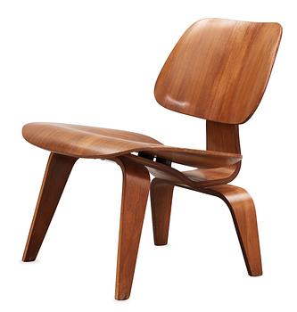 8. A Charles & Ray Eames "LCW" easy chair, by Herman Miller.