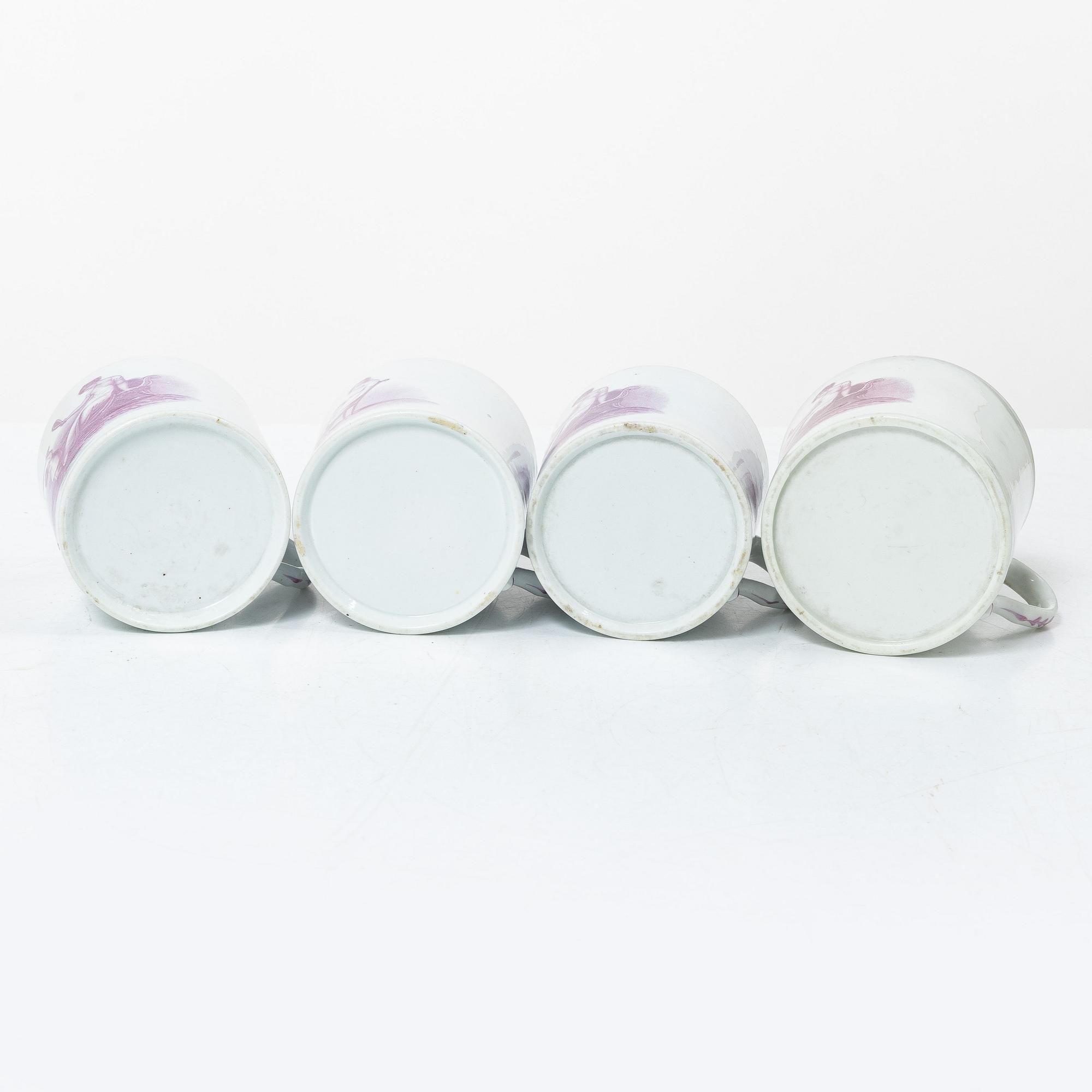 A purple camaieu part coffee service, Early 19th century.
