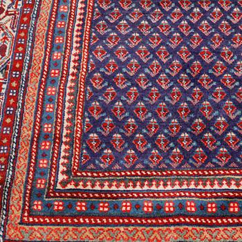 A Sarouk rug, 393 x 284 cm.