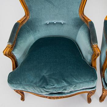 A pair of Louis XV style armchairs, mid-20th century.